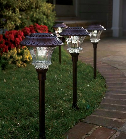 Set Of 4 Steel And Glass Encased Solar Led Path Lights