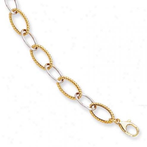 14k Two-tone Twisted Fancy Oval Link Bracelet - 7.25 Inch